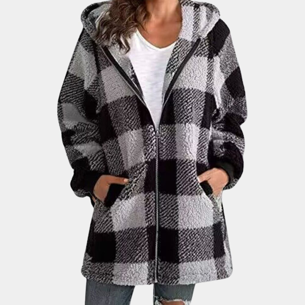 Groene geruite damesjas met capuchon, ritssluiting en zakken, gemaakt van zachte fleece stof. Perfect voor casual wintermode en warme outfits.